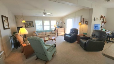 PRICE IMPROVEMENT ON THIS MOVE-IN READY, OPEN CONCEPT MOBILE on River Run Golf Links in Florida - for sale on GolfHomes.com, golf home, golf lot