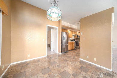 Wonderful home in the heart of Loveland; a block from Cattail on Cattail Creek Golf Course in Colorado - for sale on GolfHomes.com, golf home, golf lot