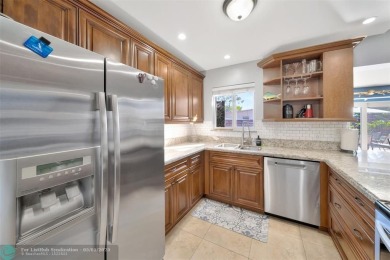 Exceptional Renovated 3-Bedroom, 2-Bath Home in the Heart of on Fort Lauderdale Country Club in Florida - for sale on GolfHomes.com, golf home, golf lot