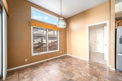 Wonderful home in the heart of Loveland; a block from Cattail on Cattail Creek Golf Course in Colorado - for sale on GolfHomes.com, golf home, golf lot