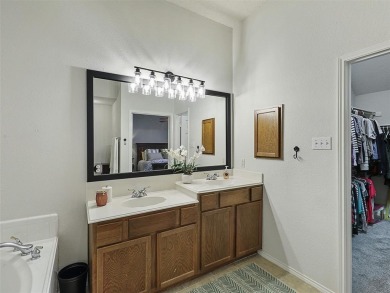 Absolutely charming 4 bedroom home in the master planned on Woodbridge Golf Club in Texas - for sale on GolfHomes.com, golf home, golf lot