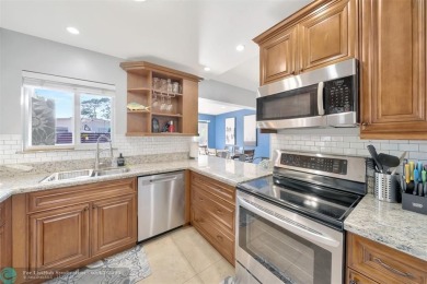 Exceptional Renovated 3-Bedroom, 2-Bath Home in the Heart of on Fort Lauderdale Country Club in Florida - for sale on GolfHomes.com, golf home, golf lot