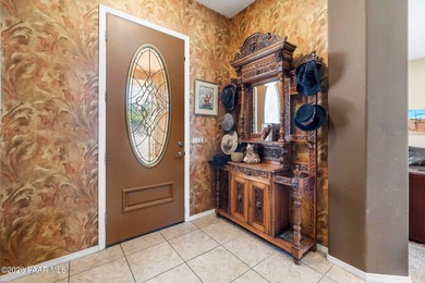 Discover refined single-level living in the prestigious enclave on Prescott Lakes Golf and Country Club in Arizona - for sale on GolfHomes.com, golf home, golf lot