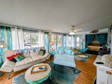 This captivating home in River Vista 55+ community offers the on The Riverside Golf Club in Florida - for sale on GolfHomes.com, golf home, golf lot