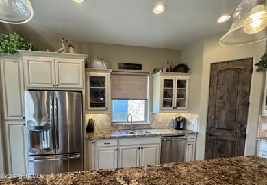 Located in the prestigious Estates neighborhood of Prescott on Prescott Lakes Golf and Country Club in Arizona - for sale on GolfHomes.com, golf home, golf lot