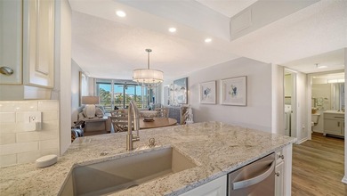 Enjoy sunny, panoramic views across the pool, lakes, and golf on Pinebrook/Ironwood Golf Course in Florida - for sale on GolfHomes.com, golf home, golf lot