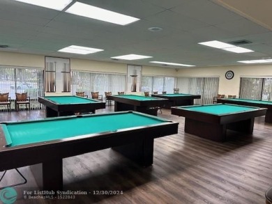Beautiful water view updated 1 bedroom, 1  1/2  bath condo on Sunrise Lakes Phase III in Florida - for sale on GolfHomes.com, golf home, golf lot