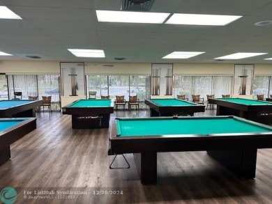 Beautiful water view updated 1 bedroom, 1  1/2  bath condo on Sunrise Lakes Phase III in Florida - for sale on GolfHomes.com, golf home, golf lot