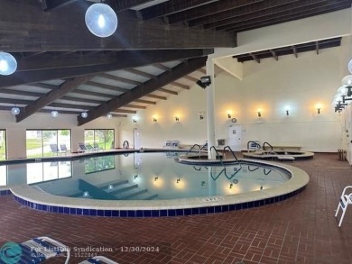 Beautiful water view updated 1 bedroom, 1  1/2  bath condo on Sunrise Lakes Phase III in Florida - for sale on GolfHomes.com, golf home, golf lot