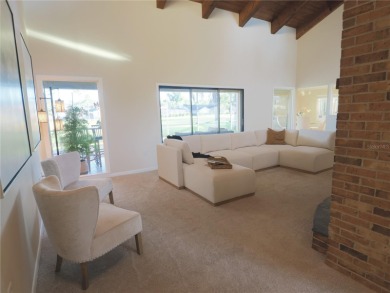 VACATION WHERE YOU LIVE... UNIQUE RARE OPPORTUNITY to own this on East Lake Woodlands Country Club in Florida - for sale on GolfHomes.com, golf home, golf lot