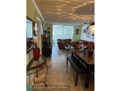 Beautiful water view updated 1 bedroom, 1  1/2  bath condo on Sunrise Lakes Phase III in Florida - for sale on GolfHomes.com, golf home, golf lot
