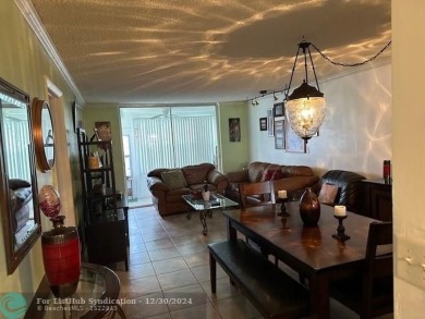 Beautiful water view updated 1 bedroom, 1  1/2  bath condo on Sunrise Lakes Phase III in Florida - for sale on GolfHomes.com, golf home, golf lot