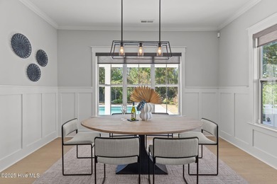 Welcome to this stunning residence nestled in the prestigious on Cape Fear National At Brunswick Forest in North Carolina - for sale on GolfHomes.com, golf home, golf lot