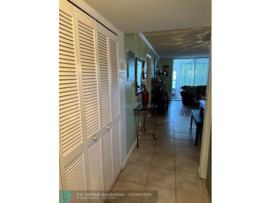 Beautiful water view updated 1 bedroom, 1  1/2  bath condo on Sunrise Lakes Phase III in Florida - for sale on GolfHomes.com, golf home, golf lot