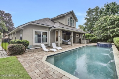 Pool home in Eagle Harbor. This stunning five-bedroom, four-bath on Eagle Harbor Golf Club in Florida - for sale on GolfHomes.com, golf home, golf lot