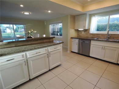 VACATION WHERE YOU LIVE... UNIQUE RARE OPPORTUNITY to own this on East Lake Woodlands Country Club in Florida - for sale on GolfHomes.com, golf home, golf lot