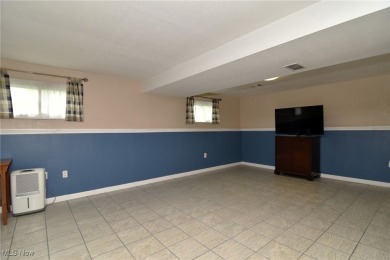 This charming bi-level home offers 3 bedrooms and 2 full baths on Gleneagles Golf Club in Ohio - for sale on GolfHomes.com, golf home, golf lot