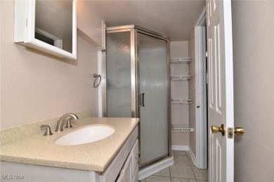 This charming bi-level home offers 3 bedrooms and 2 full baths on Gleneagles Golf Club in Ohio - for sale on GolfHomes.com, golf home, golf lot