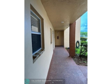 Beautiful water view updated 1 bedroom, 1  1/2  bath condo on Sunrise Lakes Phase III in Florida - for sale on GolfHomes.com, golf home, golf lot
