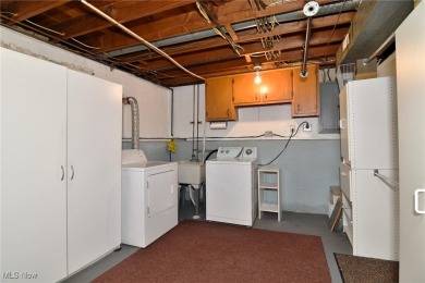 This charming bi-level home offers 3 bedrooms and 2 full baths on Gleneagles Golf Club in Ohio - for sale on GolfHomes.com, golf home, golf lot