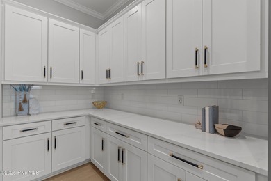 Welcome to this stunning residence nestled in the prestigious on Cape Fear National At Brunswick Forest in North Carolina - for sale on GolfHomes.com, golf home, golf lot