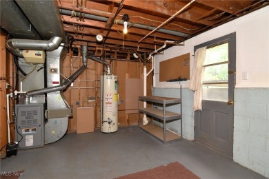This charming bi-level home offers 3 bedrooms and 2 full baths on Gleneagles Golf Club in Ohio - for sale on GolfHomes.com, golf home, golf lot