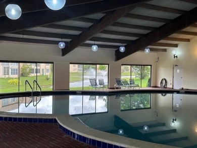 Beautiful water view updated 1 bedroom, 1  1/2  bath condo on Sunrise Lakes Phase III in Florida - for sale on GolfHomes.com, golf home, golf lot