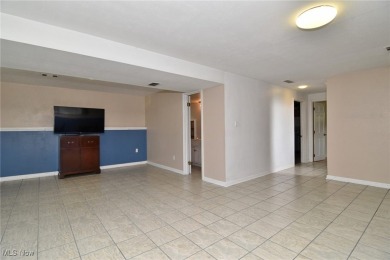 This charming bi-level home offers 3 bedrooms and 2 full baths on Gleneagles Golf Club in Ohio - for sale on GolfHomes.com, golf home, golf lot