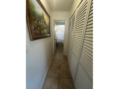 Beautiful water view updated 1 bedroom, 1  1/2  bath condo on Sunrise Lakes Phase III in Florida - for sale on GolfHomes.com, golf home, golf lot