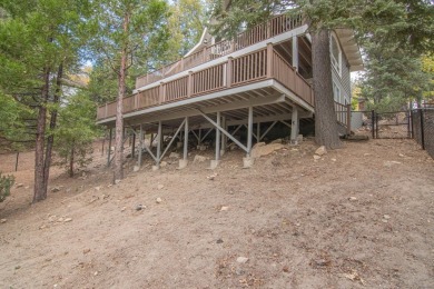 Home situated on the golf course with a beautiful view from the on Lake Arrowhead Country Club in California - for sale on GolfHomes.com, golf home, golf lot