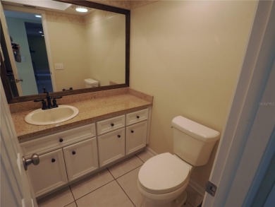 VACATION WHERE YOU LIVE... UNIQUE RARE OPPORTUNITY to own this on East Lake Woodlands Country Club in Florida - for sale on GolfHomes.com, golf home, golf lot