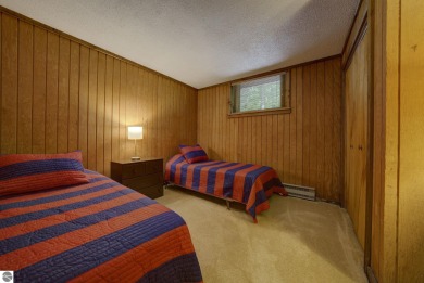 This stunning 5-Bedroom Retreat at Shanty Creek Resorts is on Shanty Creek Golf Course in Michigan - for sale on GolfHomes.com, golf home, golf lot