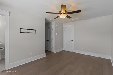 Welcome to this stunning residence nestled in the prestigious on Cape Fear National At Brunswick Forest in North Carolina - for sale on GolfHomes.com, golf home, golf lot