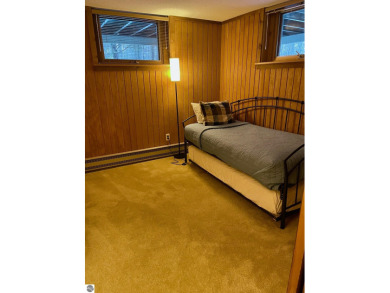 This stunning 5-Bedroom Retreat at Shanty Creek Resorts is on Shanty Creek Golf Course in Michigan - for sale on GolfHomes.com, golf home, golf lot