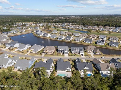 Welcome to this stunning residence nestled in the prestigious on Cape Fear National At Brunswick Forest in North Carolina - for sale on GolfHomes.com, golf home, golf lot