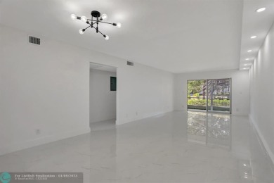 STEP INTO ELEGANCE! 1ST FLOOR FULLY RENOVATED CONDO, OPEN on Wynmoor Golf Course in Florida - for sale on GolfHomes.com, golf home, golf lot