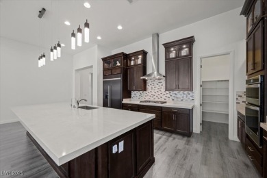 Experience upscale desert living in this stunning single-story on South Shore At Lake Las Vegas in Nevada - for sale on GolfHomes.com, golf home, golf lot