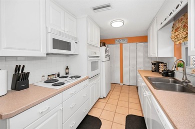 Amazing Dunedin location!! This 3 bedroom/1.5 bath/2 car garage on The Dunedin Country Club in Florida - for sale on GolfHomes.com, golf home, golf lot