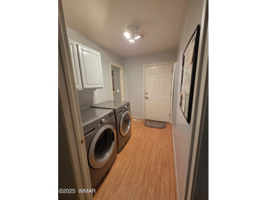 Step inside this pristine and updated single family home in the on Bison Golf and Country Club in Arizona - for sale on GolfHomes.com, golf home, golf lot
