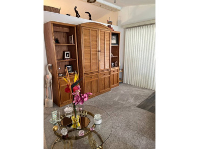 Welcome to this beautifully maintained 2/2 home where you will on Lake Henry Golf Club in Florida - for sale on GolfHomes.com, golf home, golf lot