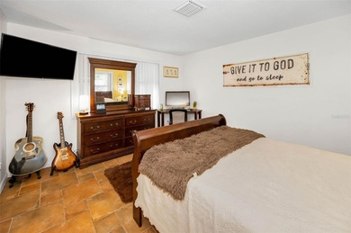 Amazing Dunedin location!! This 3 bedroom/1.5 bath/2 car garage on The Dunedin Country Club in Florida - for sale on GolfHomes.com, golf home, golf lot