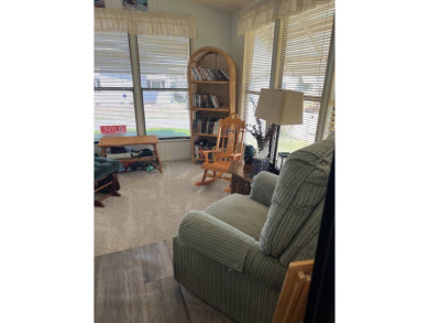 Welcome to this beautifully maintained 2/2 home where you will on Lake Henry Golf Club in Florida - for sale on GolfHomes.com, golf home, golf lot