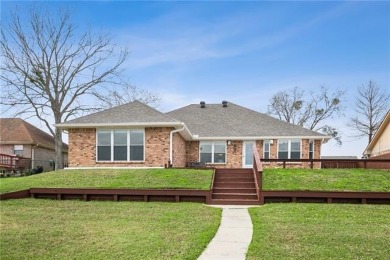 Pristine waterfront home with views of Oak Harbor Golf Course. 4 on Oak Harbor Golf Club in Louisiana - for sale on GolfHomes.com, golf home, golf lot