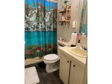 Welcome to this beautifully maintained 2/2 home where you will on Lake Henry Golf Club in Florida - for sale on GolfHomes.com, golf home, golf lot