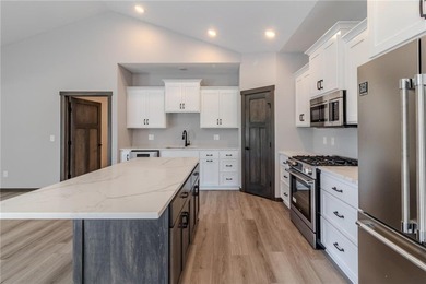 Welcome to this stunning townhome on the beautiful Pebble Creek on Pebble Creek Golf Club in Minnesota - for sale on GolfHomes.com, golf home, golf lot