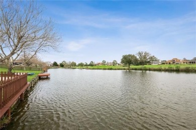 Pristine waterfront home with views of Oak Harbor Golf Course. 4 on Oak Harbor Golf Club in Louisiana - for sale on GolfHomes.com, golf home, golf lot