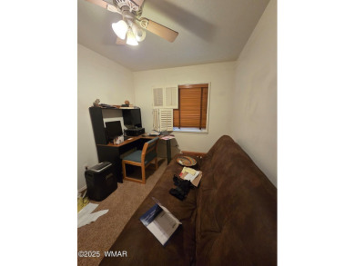 Step inside this pristine and updated single family home in the on Bison Golf and Country Club in Arizona - for sale on GolfHomes.com, golf home, golf lot