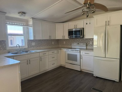 Here's a little slice a peace and happiness! Located on a on Golden Lakes Golf Course in Florida - for sale on GolfHomes.com, golf home, golf lot