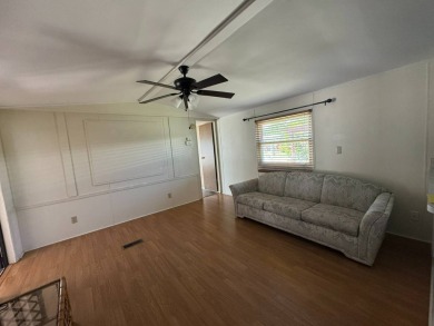 Here's a little slice a peace and happiness! Located on a on Golden Lakes Golf Course in Florida - for sale on GolfHomes.com, golf home, golf lot