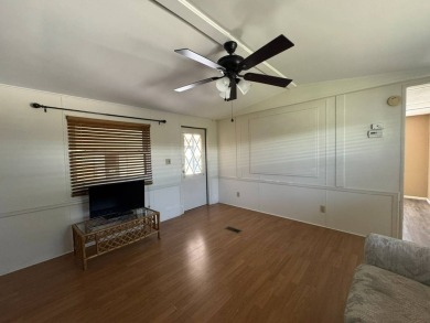 Here's a little slice a peace and happiness! Located on a on Golden Lakes Golf Course in Florida - for sale on GolfHomes.com, golf home, golf lot